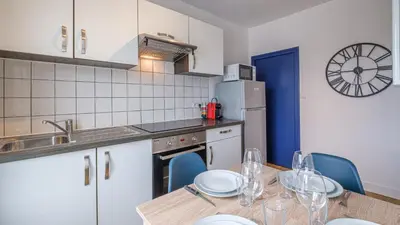 Cuisine ou kitchenette dans l'établissement Bleu Nuit - Welc'Home