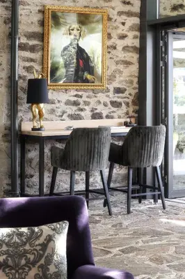 Coin salon dans l'établissement Hôtel Joyet de Maubec