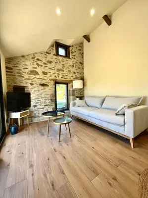 Télévision ou salle de divertissement dans l'établissement Dépendance corps de ferme