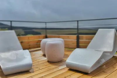Balcon ou terrasse dans l'établissement La Flèche 2 - Chalet Standing - Jacuzzi Privatif