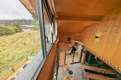 Balcon ou terrasse dans l'établissement La Flèche 2 - Chalet Standing - Jacuzzi Privatif