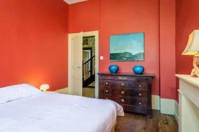 Un ou plusieurs lits dans un hébergement de l'établissement Le petit chateau