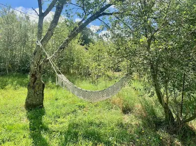 Jardin de l'établissement Les Maisons du Bonheur & Balnéo