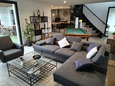 Coin salon dans l'établissement Maison d'Architecte