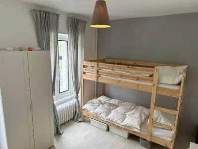 Un ou plusieurs lits dans un hébergement de l'établissement Villa Stella 8pers. La Bourboule
