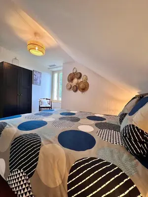 Un ou plusieurs lits dans un hébergement de l'établissement Maison 6 personnes - Spa privé Jardin Pétanque - Proche gare Brive