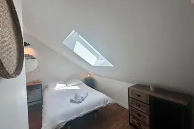 Un ou plusieurs lits dans un hébergement de l'établissement Maison 6 personnes - Spa privé Jardin Pétanque - Proche gare Brive