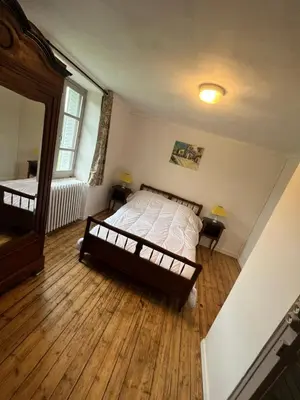Un ou plusieurs lits dans un hébergement de l'établissement maison de campagne