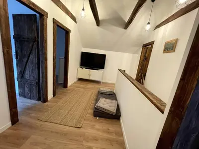 Télévision ou salle de divertissement dans l'établissement Gîte du Pays-de-Salers, Cantal, classé 1*