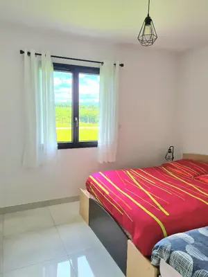 Un ou plusieurs lits dans un hébergement de l'établissement Maison tout près d’Aurillac - Monts du Cantal