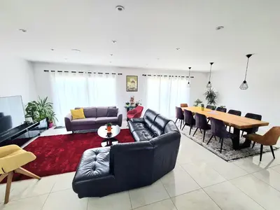 Coin salon dans l'établissement Maison tout près d’Aurillac - Monts du Cantal