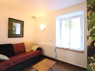Coin salon dans l'établissement Appartement T2 avec WiFi, proche thermes, 4 pers, Mont-Dore - FR-1-608-252