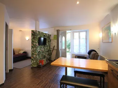 Coin salon dans l'établissement Appartement T2 avec WiFi, proche thermes, 4 pers, Mont-Dore - FR-1-608-252
