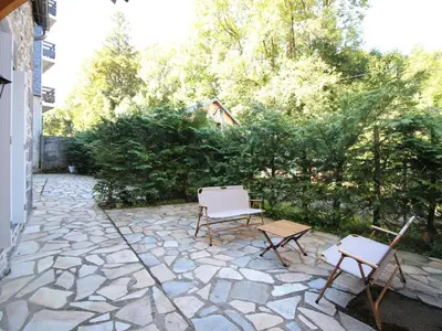 Jardin de l'établissement Appartement T2 avec WiFi, proche thermes, 4 pers, Mont-Dore - FR-1-608-252