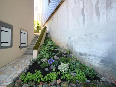Jardin de l'établissement Appartement T2 avec WiFi, proche thermes, 4 pers, Mont-Dore - FR-1-608-252
