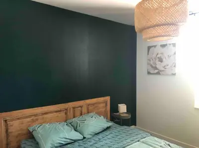 Un ou plusieurs lits dans un hébergement de l'établissement Maison entièrement renovee
