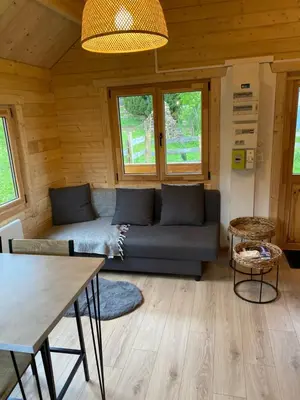 Coin salon dans l'établissement Chalet des fontaines claires