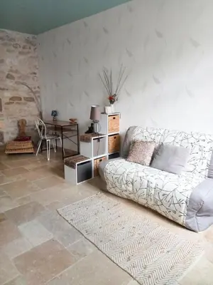 Coin salon dans l'établissement Appartement au rez-de-chaussée