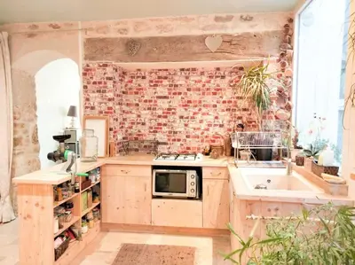 Cuisine ou kitchenette dans l'établissement Appartement au rez-de-chaussée