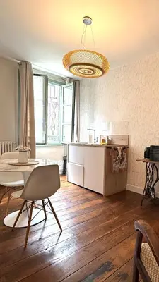 Coin salon dans l'établissement Maison d'hôte Les Allois