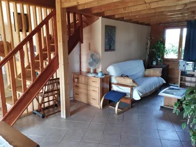 Coin salon dans l'établissement Chalet Les Adrets du Sancy