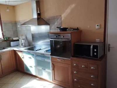 Cuisine ou kitchenette dans l'établissement Chalet Les Adrets du Sancy