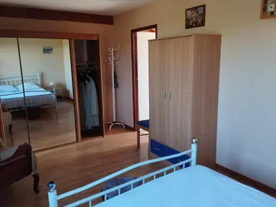 Un ou plusieurs lits dans un hébergement de l'établissement Chalet Les Adrets du Sancy