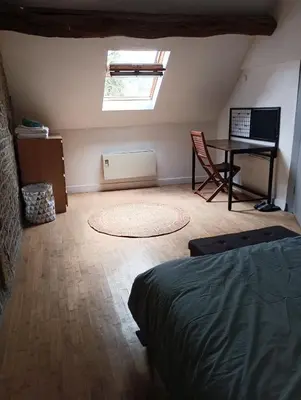 Télévision ou salle de divertissement dans l'établissement Cottage reflet de bonheur
