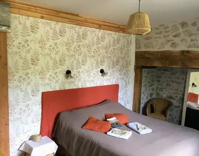 Un ou plusieurs lits dans un hébergement de l'établissement LES PIPISTRELLES 19 - chambre d'hotes