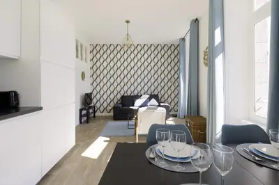 Coin salon dans l'établissement Villa Pax 1 et 2 La Bourboule