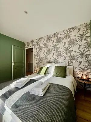 Un ou plusieurs lits dans un hébergement de l'établissement Limoges Sud-LesCinqSuites-L'Eden - DABNB