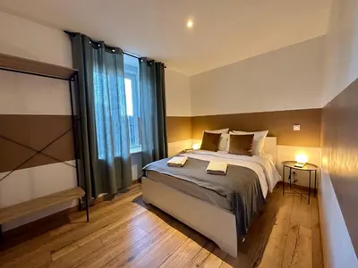 Un ou plusieurs lits dans un hébergement de l'établissement Limoges Sud-LesCinqSuites Le Saint Laurent-DABNB