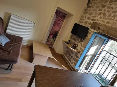 Télévision ou salle de divertissement dans l'établissement gîte le Ranch de Vassiviére
