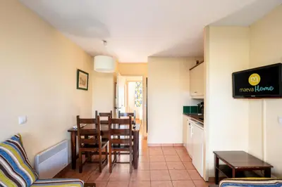 Télévision ou salle de divertissement dans l'établissement Résidence Les Belles Rives - maeva Home - Appartement 2 pièces 5 personnes - Confort MAE-4334