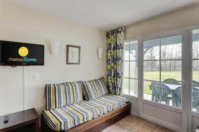 Coin salon dans l'établissement Résidence Les Belles Rives - maeva Home - Appartement 2 Pièces 5 Personnes - Confort MAE-5614
