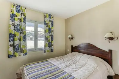 Un ou plusieurs lits dans un hébergement de l'établissement Résidence Les Belles Rives - maeva Home - Appartement 2 Pièces 5 Personnes - Confort MAE-5614