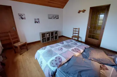 Un ou plusieurs lits dans un hébergement de l'établissement La Maison des 3 Bouleaux