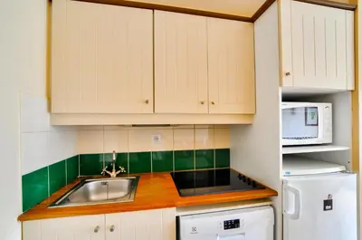 Cuisine ou kitchenette dans l'établissement Résidence Les Belles Rives - maeva Home - Appartement 3 pièces 7 personnes - Confort MAE-5454
