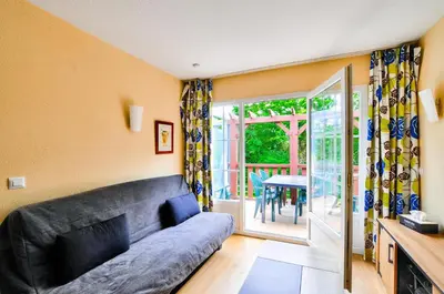 Coin salon dans l'établissement Résidence Les Belles Rives - maeva Home - Appartement 2 pièces 6 personnes - Sélection MAE-2484