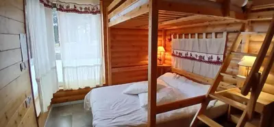 Un ou plusieurs lits dans un hébergement de l'établissement Appartement les Coquelicots Super Besse