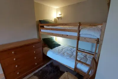 Un ou plusieurs lits dans un hébergement de l'établissement Le Bois Haut