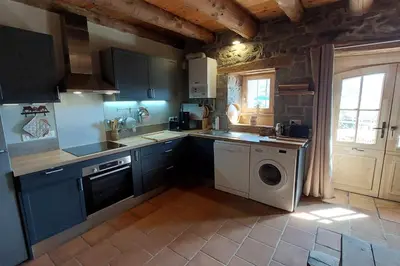 Cuisine ou kitchenette dans l'établissement Le Bois Haut