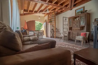 Coin salon dans l'établissement Maison familiale du pont Millénaire