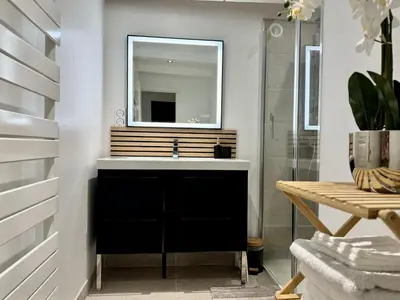 Salle de bains dans l'établissement Le Quatorze