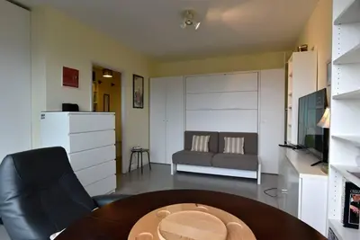 Coin salon dans l'établissement STUDiO LUXUEUX AVEC VUE SUR CORREZE