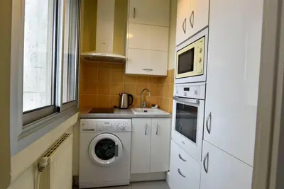 Cuisine ou kitchenette dans l'établissement STUDiO LUXUEUX AVEC VUE SUR CORREZE