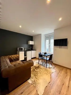 Coin salon dans l'établissement LesCinqSuites / Le Chivas - DABNB
