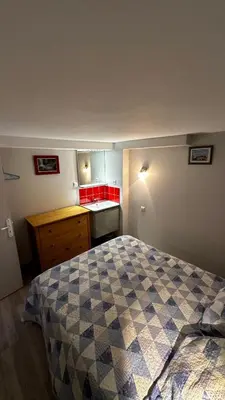 Un ou plusieurs lits dans un hébergement de l'établissement Le Sarciron 10 Duplex Le Mont Dore