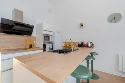 Cuisine ou kitchenette dans l'établissement Le Majestueux du Cœur de Ville, Lumineux-Spacieux