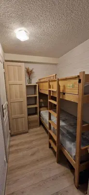 Un ou plusieurs lits dans un hébergement de l'établissement Studio Super-Besse - 4 personnes